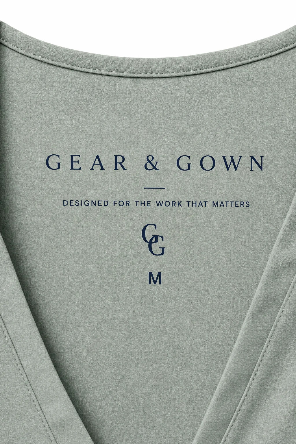 Gear & Gown printed inside-neck label. Designed for the work that matters.